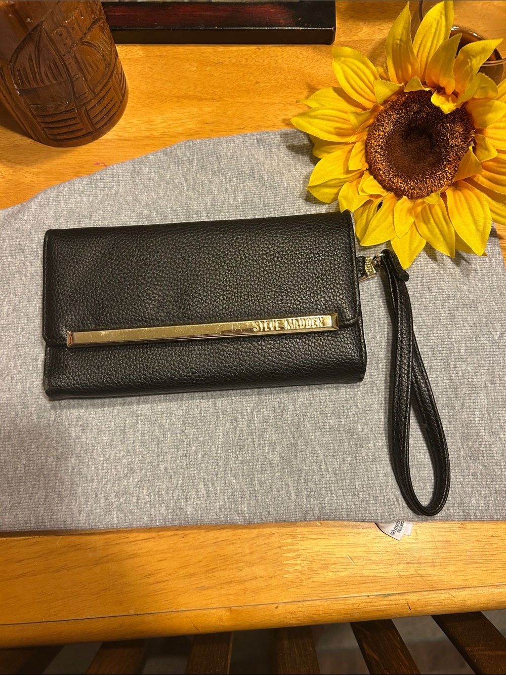 Steve Madden Black Pebbled Leather Wristlet with Gold Accent Bar
